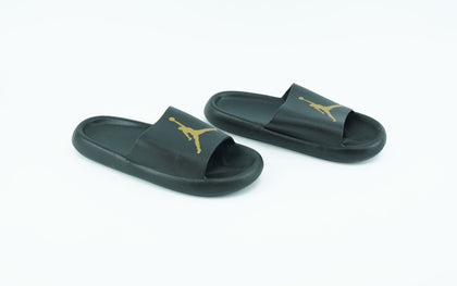 Black and gold jordan slides best sale